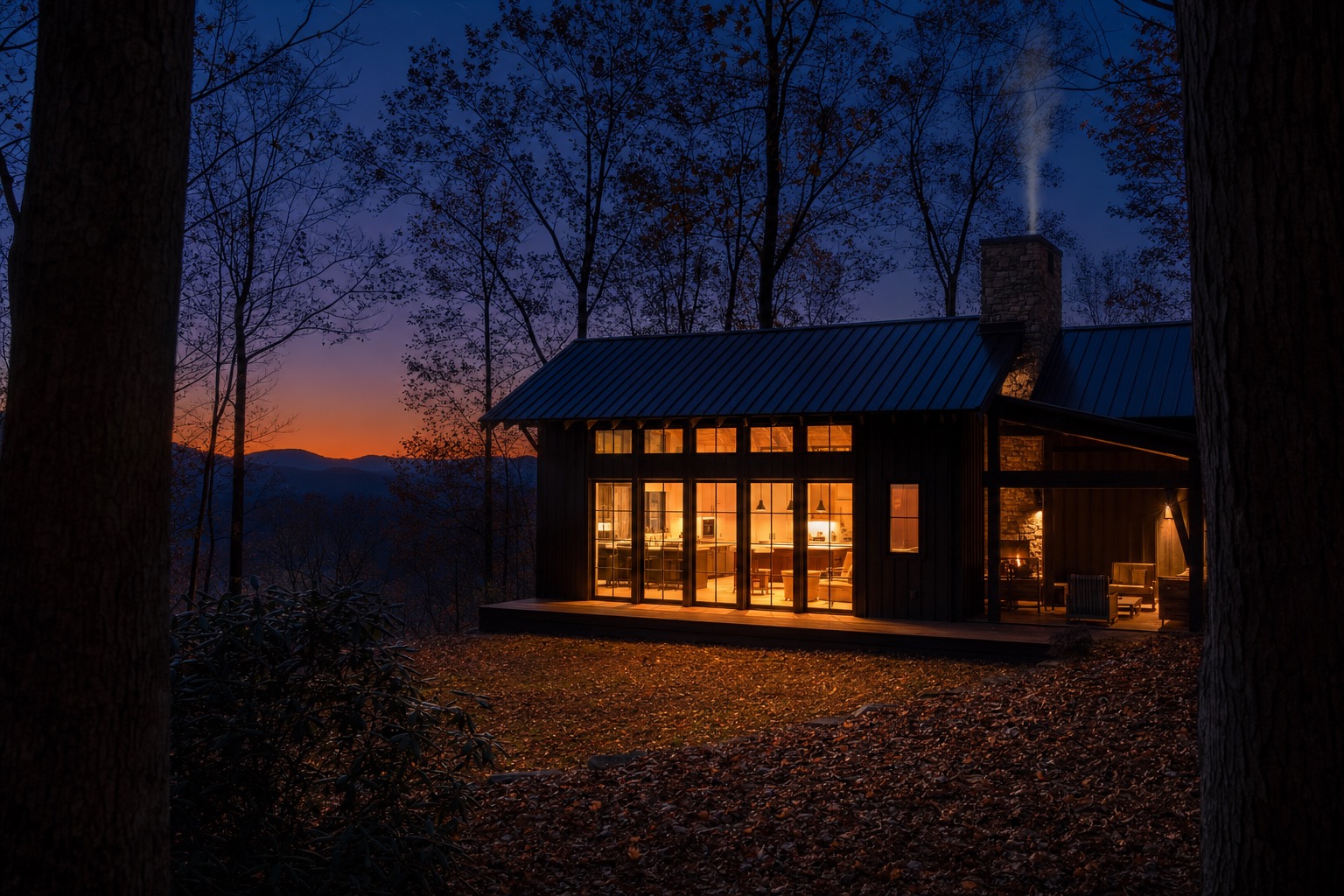 Glass and timber home glowing at dusk in the forest